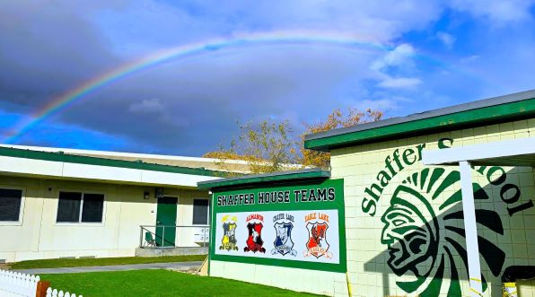 School campus with rainbow